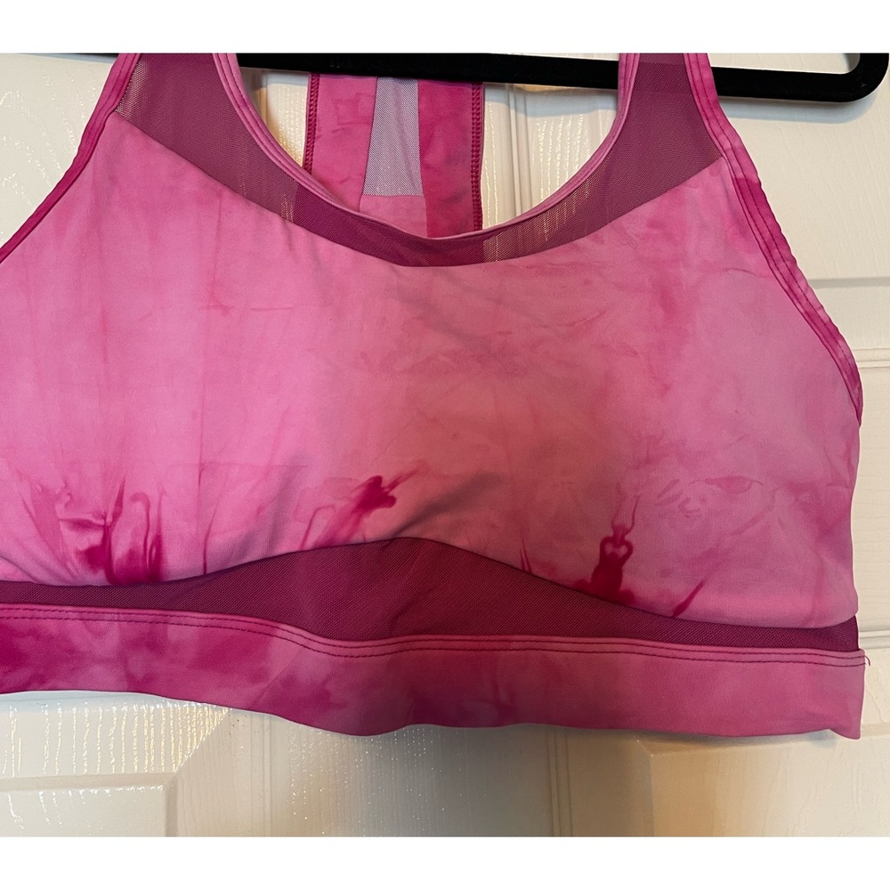 ZYIA New Without Tags Fuchsia Pink Mesh Sports Bra in size XL with padding.